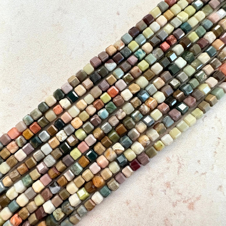 Faceted squared gemstone beads, 16 inches.