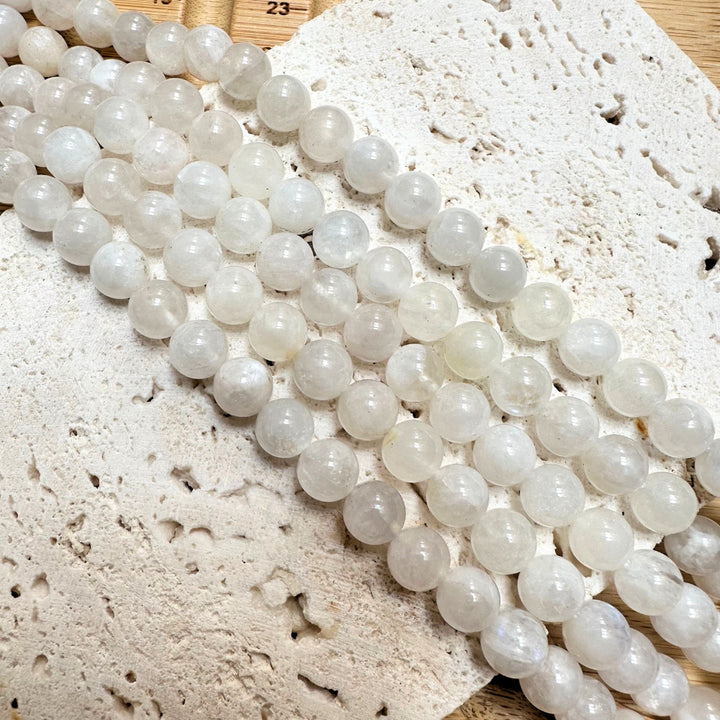 8mm round white moonstone beads, glossy, 1 strand, 16 inches, approx. 48 beads.