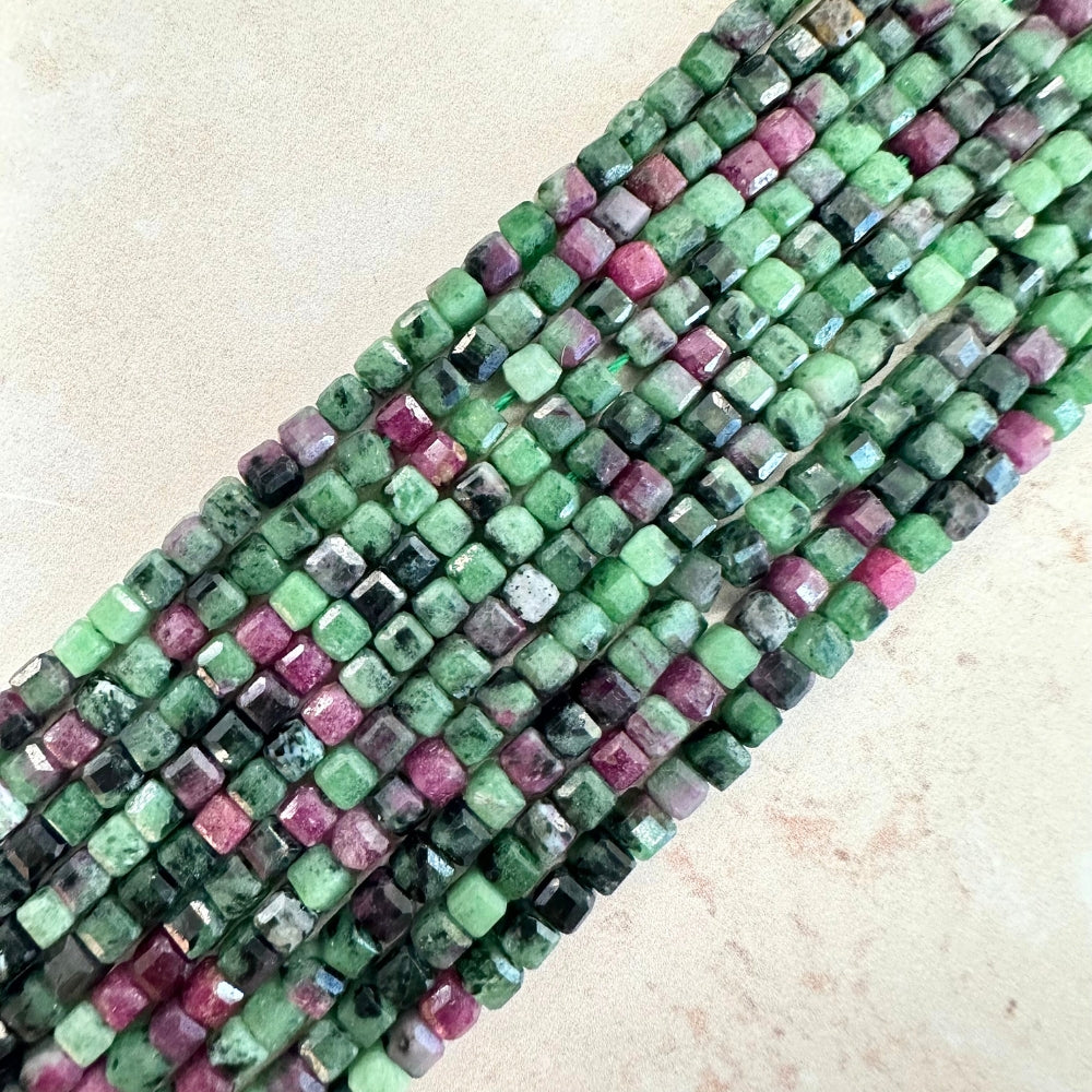 Faceted squared gemstone beads, 16 inches.