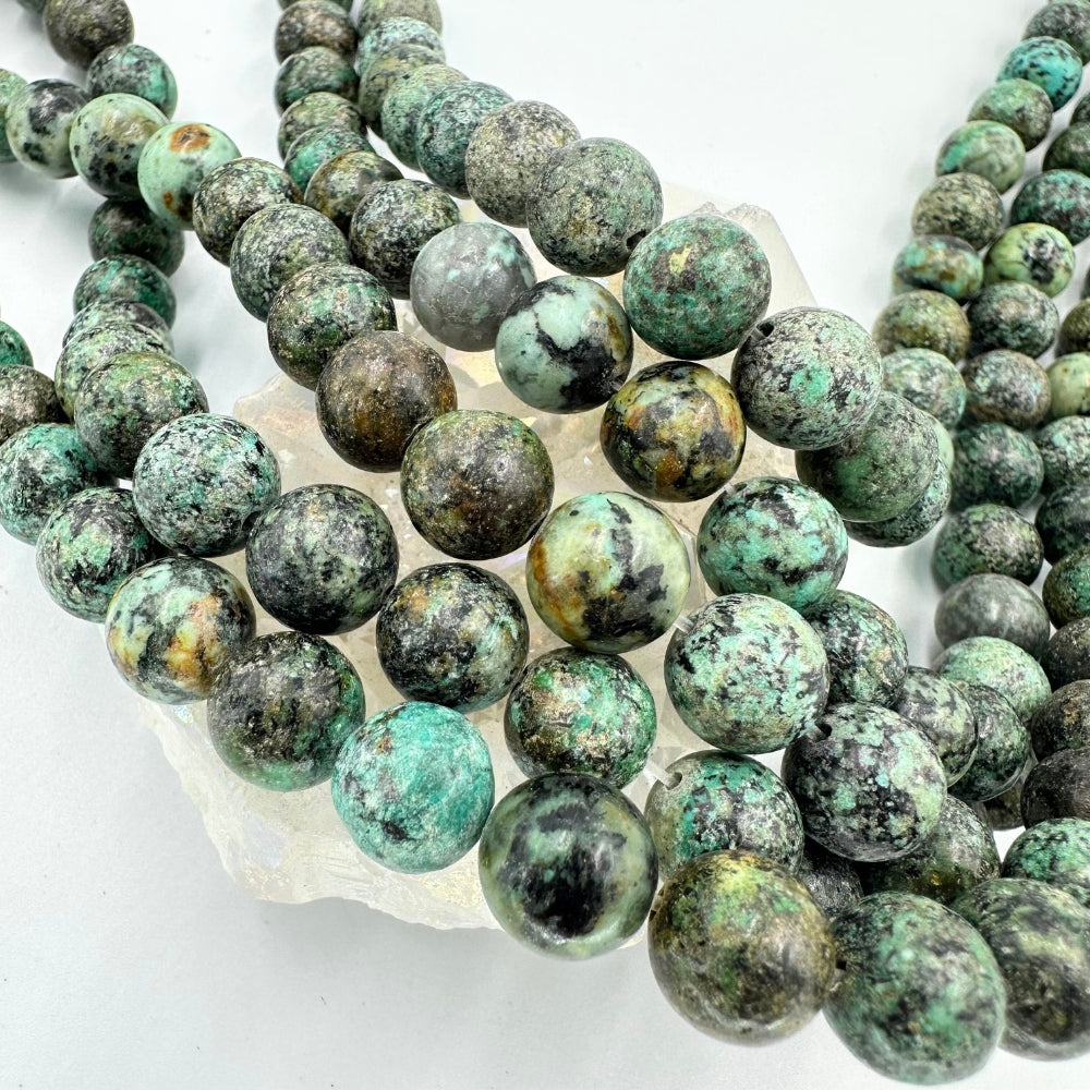 African turquoise, 8mm, round, glossy, 1 strand, 16 inches, approx. 48 beads.
