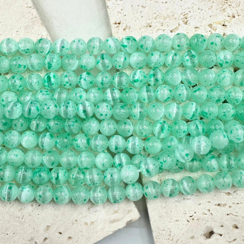 Green Strawberry Selenite, 8mm, sold as 1 strand, 16 inches, approx 48 beads.