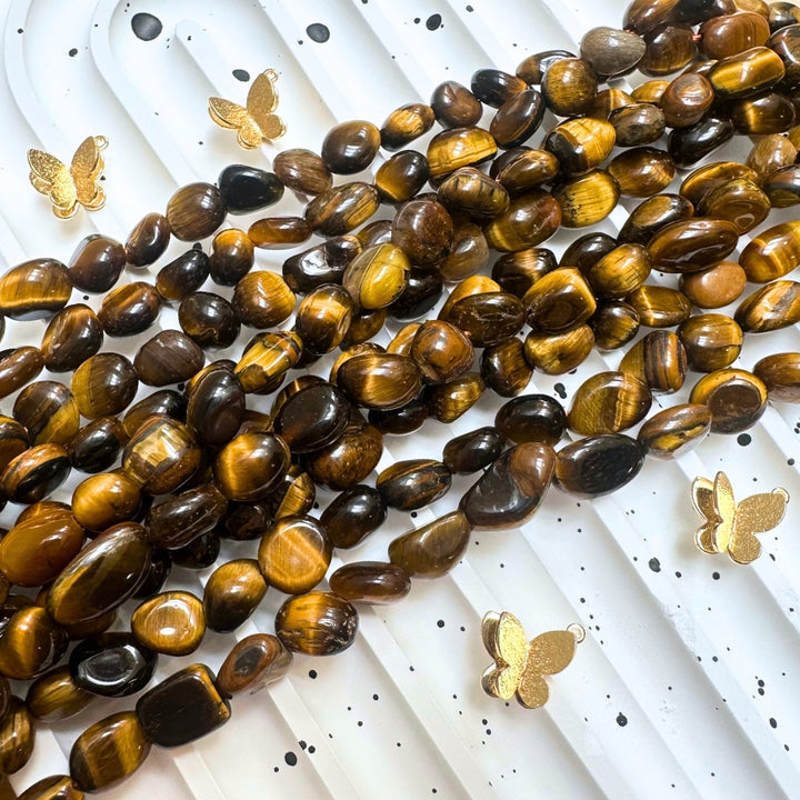 Yellow Tiger eye, approx. 8mm x 5mm, nugget, glossy, 1 strand, 16 inches, approx. 50 beads.