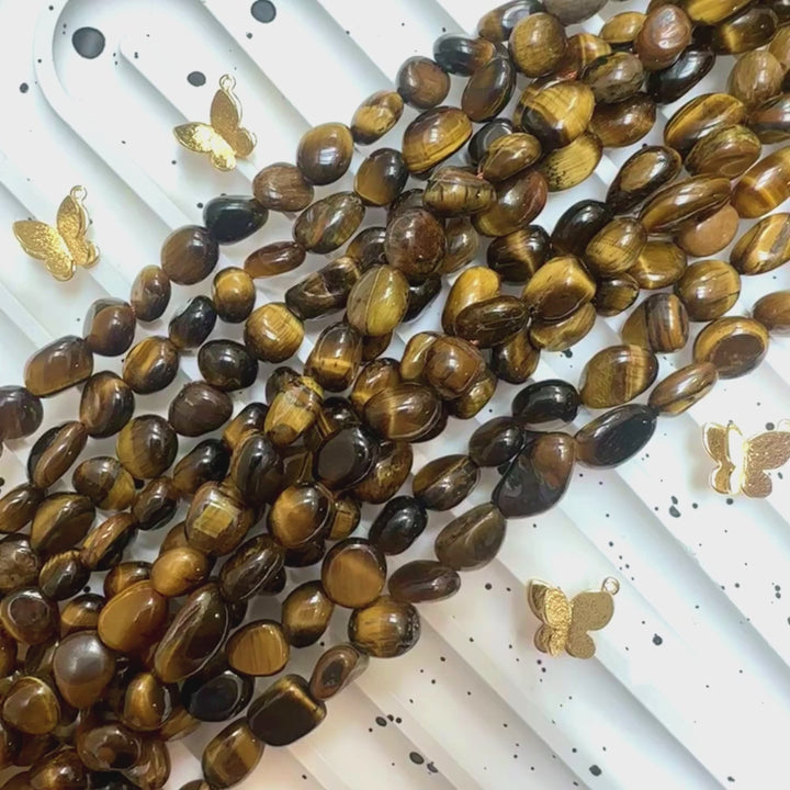Yellow Tiger eye, approx. 8mm x 5mm, nugget, glossy, 1 strand, 16 inches, approx. 50 beads.