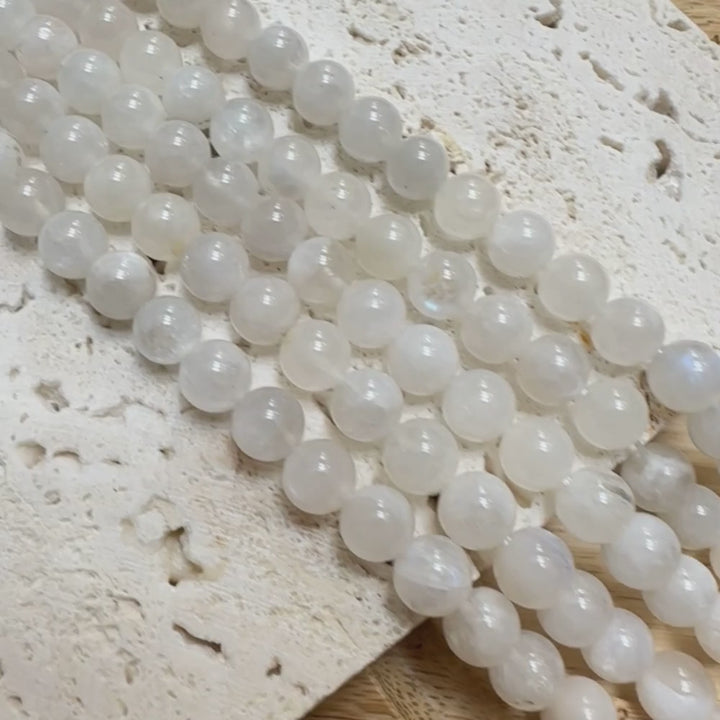 8mm round white moonstone beads, glossy, 1 strand, 16 inches, approx. 48 beads.